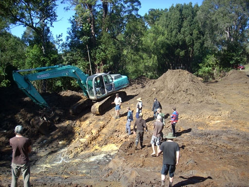 dam being built by 25 tonne excavator