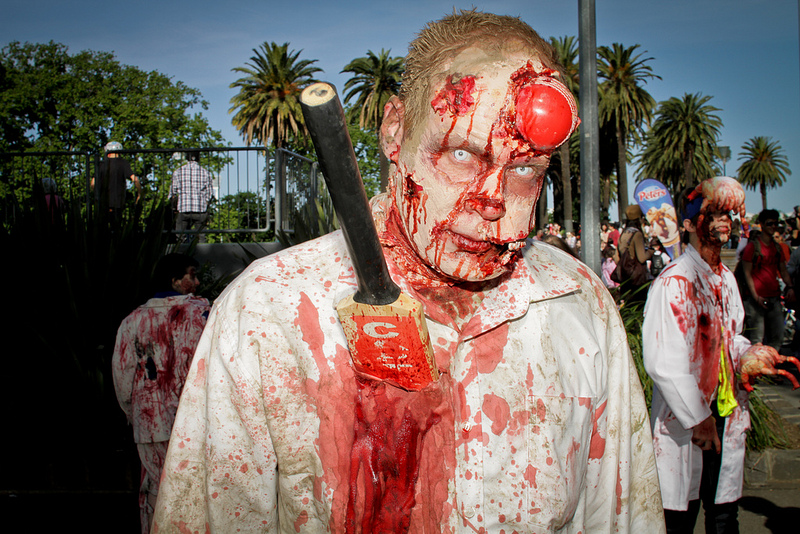 zombie with cicket ball stuck in head and cricket bat stuck in body